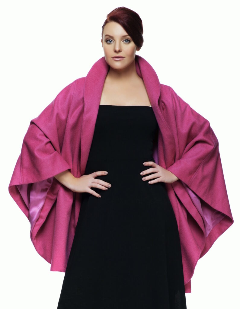 Cocoon cape with deep flounce in pink cashmere/wool coating and lined with silk