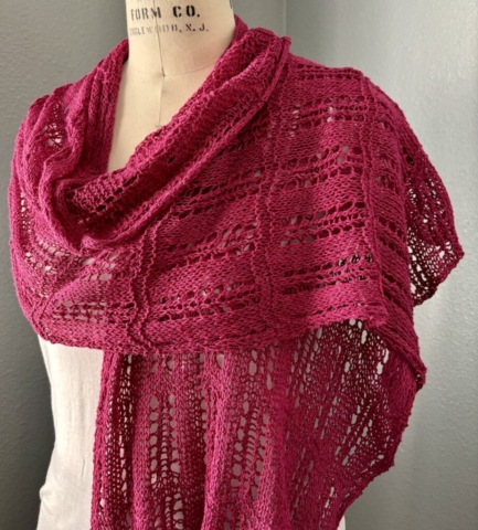 Wrapped hand-knit scarf in berry pink silk yarn