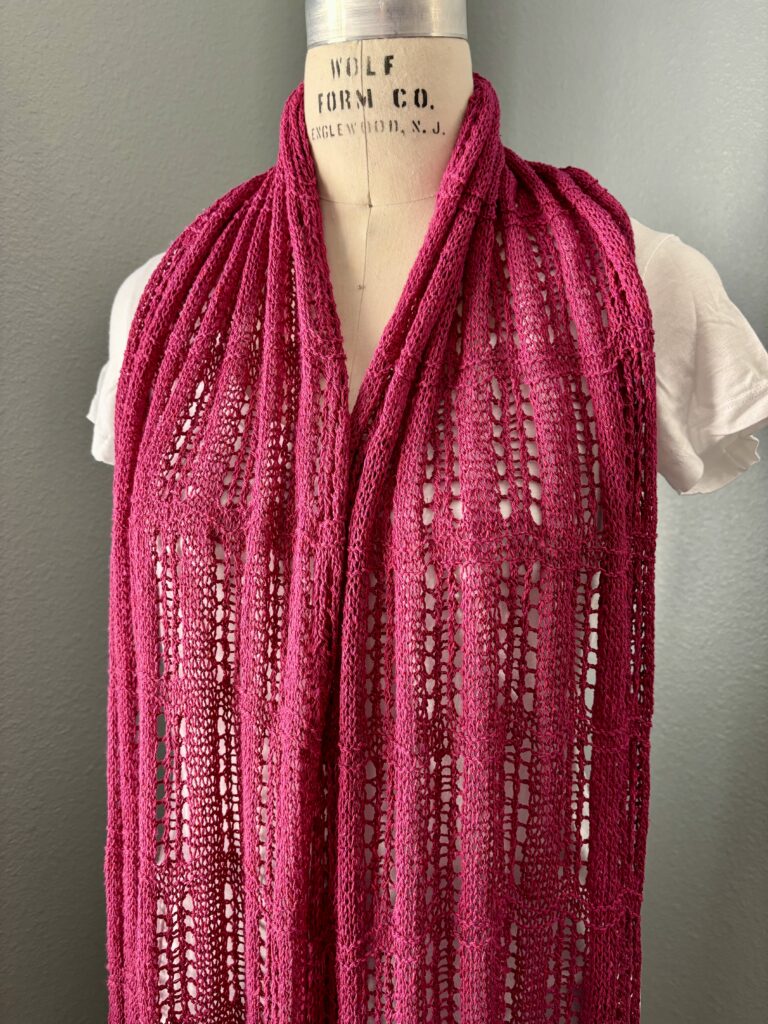 Draped hand-knit scarf in berry pink silk yarn