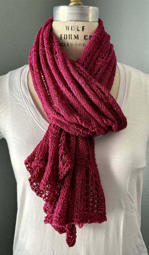 Looped hand-knit scarf in berry pink silk yarn