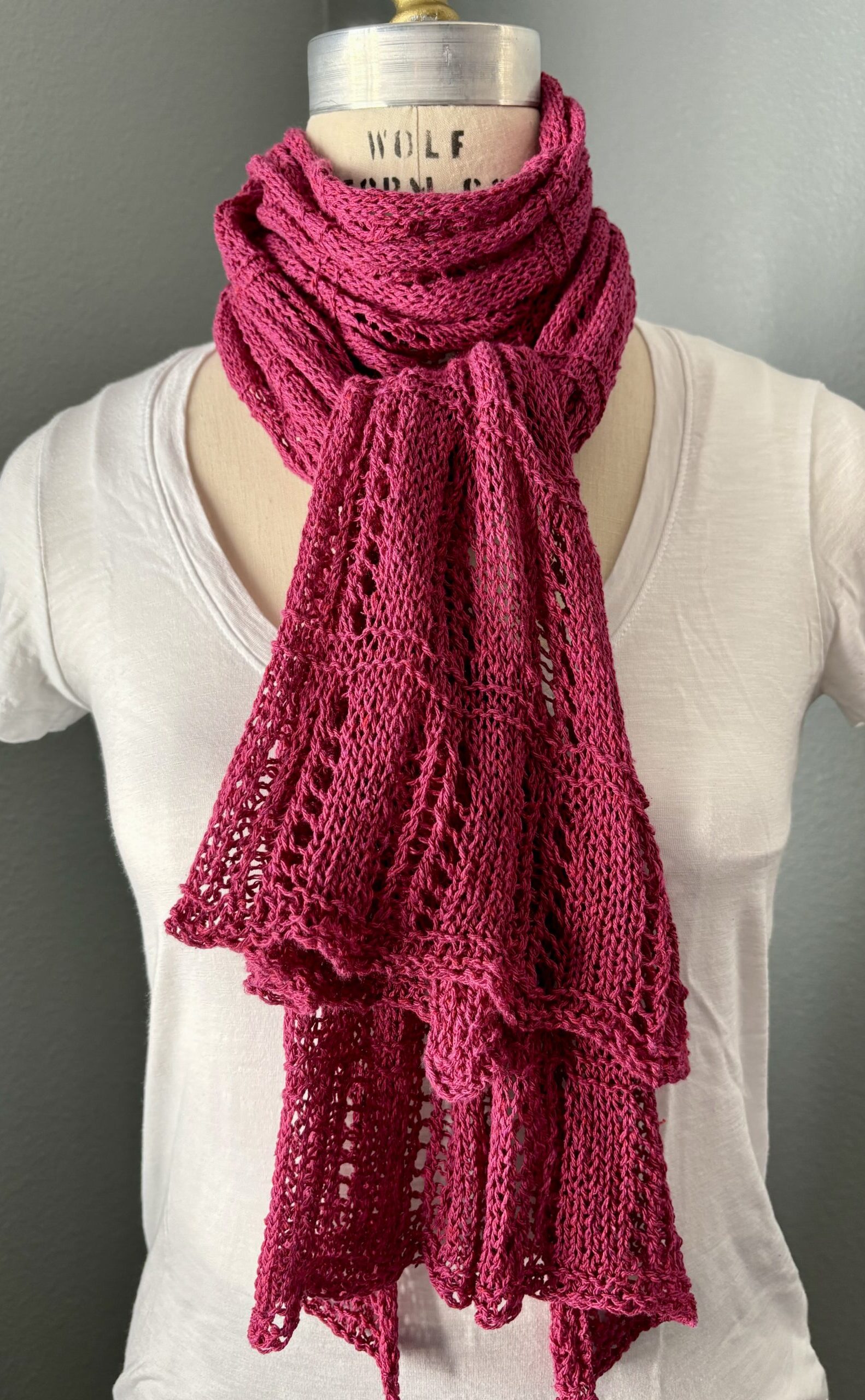 Tied in front hand-knit scarf in berry pink silk yarn