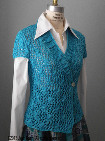 Handknit wrap top with ruched neckline and lacy cable pattern