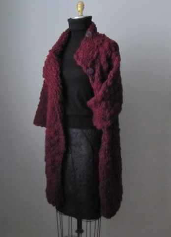 Handknit oversize cocoon coat with asymmetric button closure