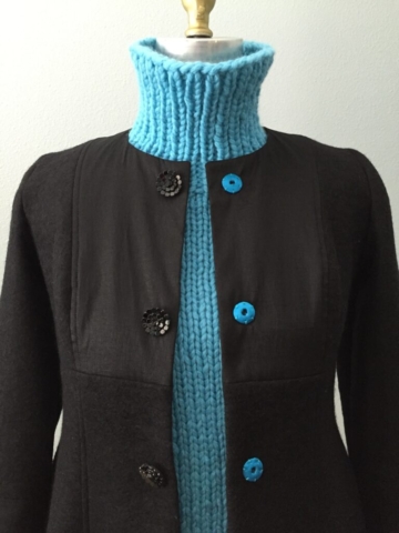 Handknit chunky sleeveless turtleneck with high-low hem in turquoise