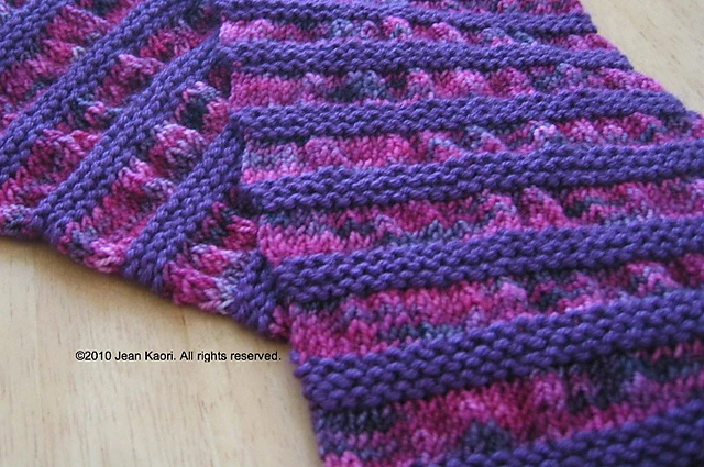 Handknit scarf with ruching detail