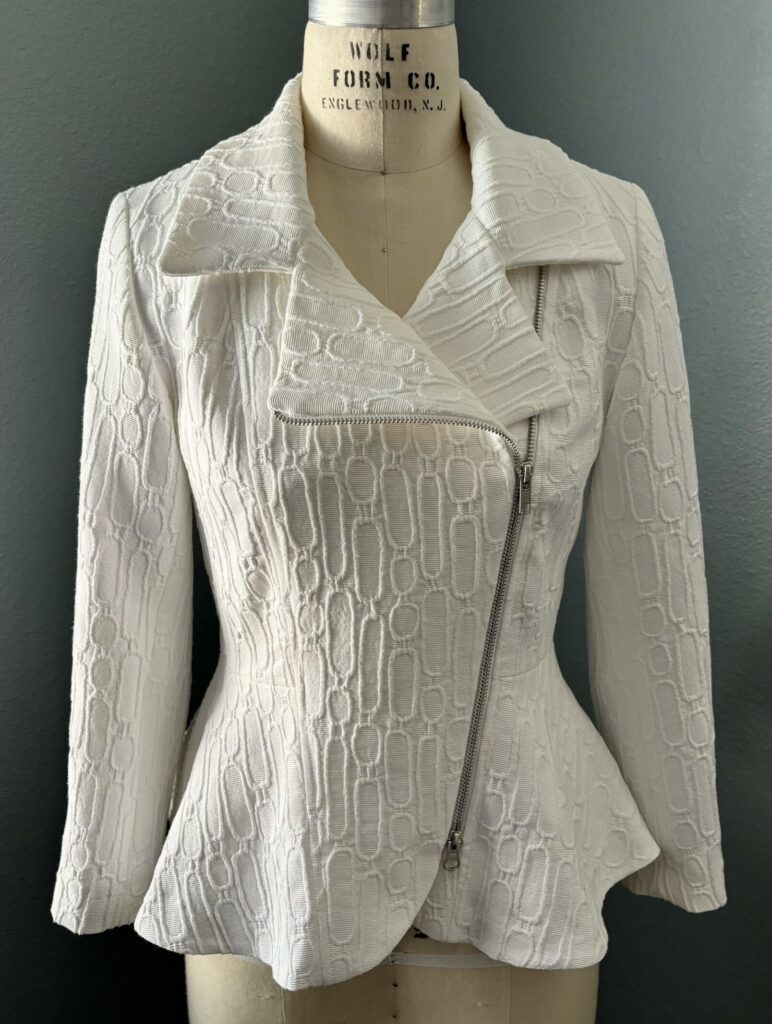 White peplum moto jacket handmade in textured fabric