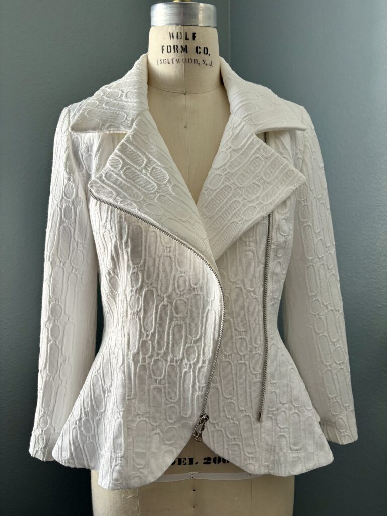 Unzipped view of the Peplum Moto Jacket